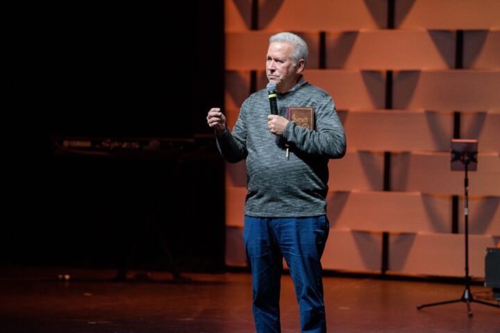 Strack talks in the mic to the audience