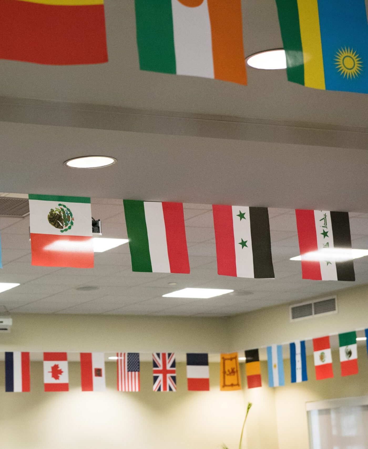 Many international flags put in a room