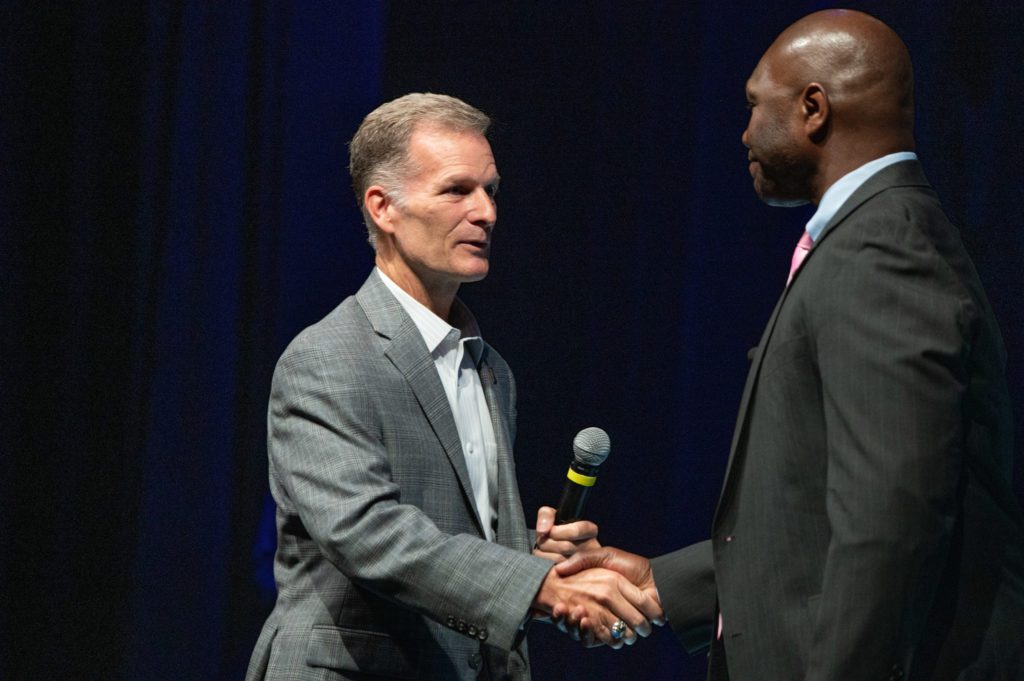 President Dr. Dondi Costin welcomes Chapel speaker Major General Rodney Lewis at Chapel