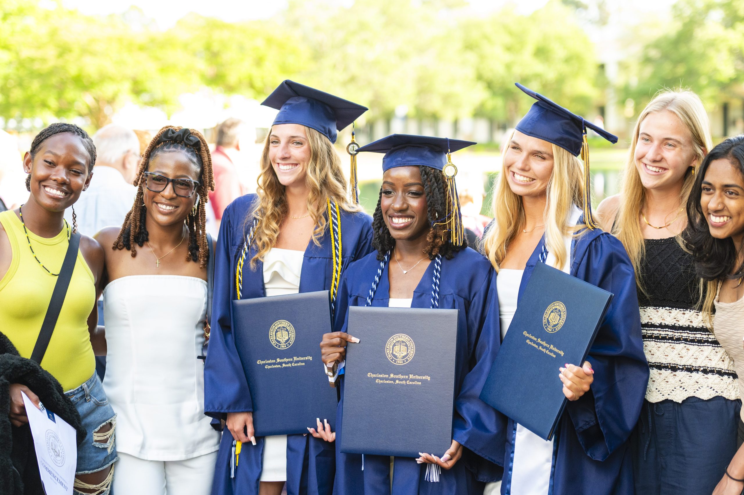 CSU students gather with family and friends after receiving their diplomas