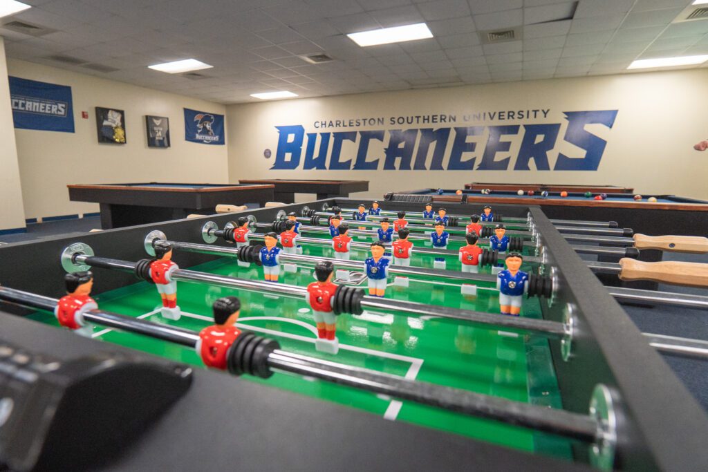 The kicker ball game and the billiard table in the Brewer center.