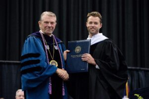 John Osborne receives distinguished service award