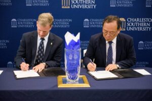 CSU President Dondi Costin and South Korea's Kangnam University President Shinil Yoon sign an agreement of partnership