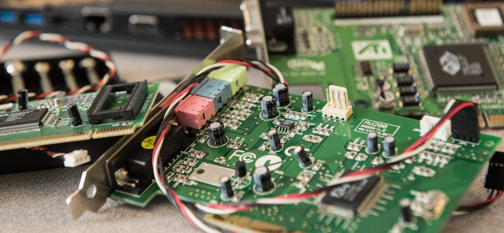 Computer parts on a table.