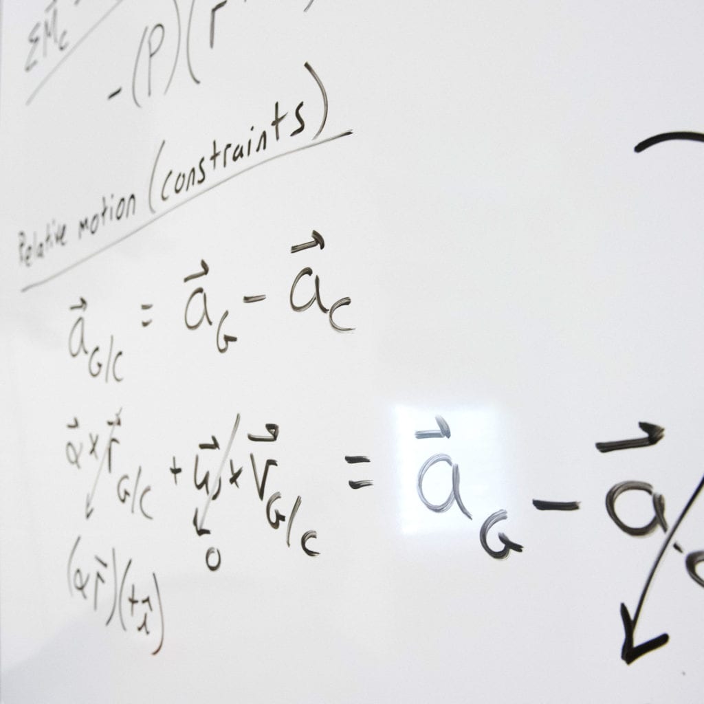 Math equations on a whiteboard.