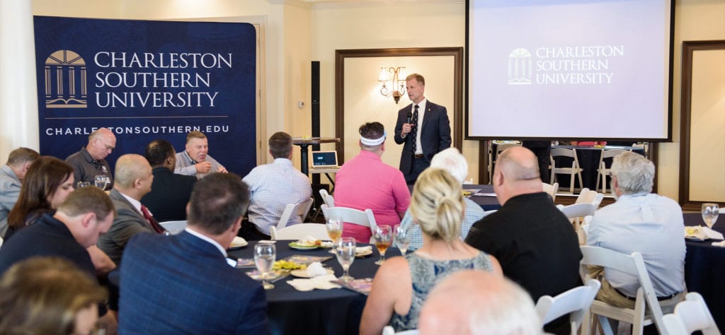 CSU President Dondi Costin speaking to a group of CSU supporters at a CSU Come to You event.