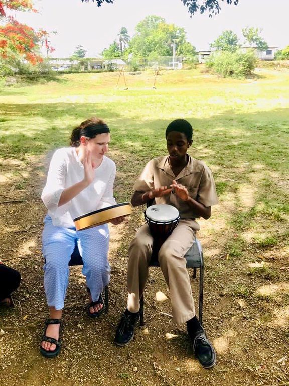 Melinda Gorsky works with a client in Jamaica.