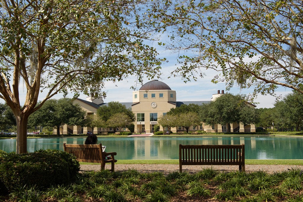 A view of the science building from across the reflection pond at CSU