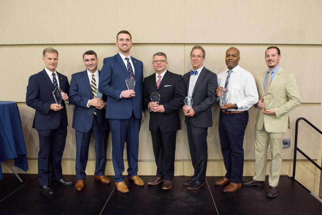 2019 Alumni award winners: Colonel Greg Woodbury, Keith Faulkner, Adam Kirtley, Frankie Melton, Julian Smith, Andy Casson, Lecius Moore