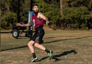 Matt Koons sprints during an ultimate frisbee match