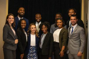 Multiple people are dressed up professionally