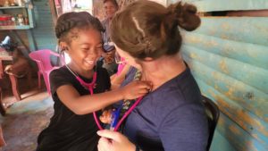 Caroline Home visit to a child