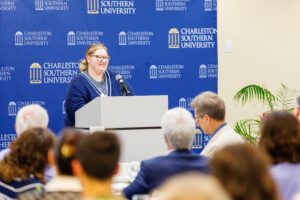Grayson Freeman speaking at the annual scholarship luncheon