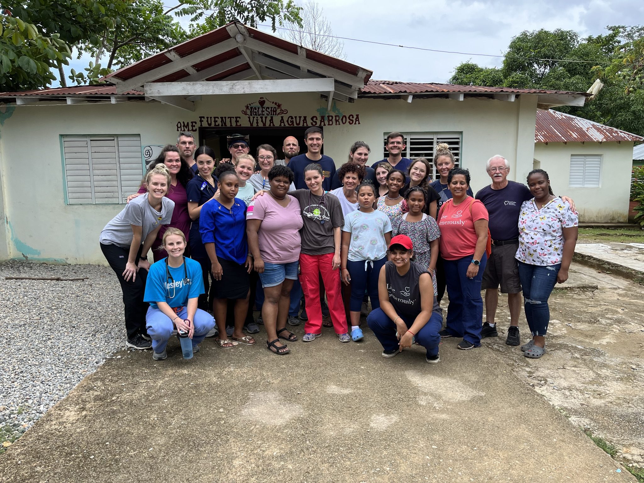 PA program posing as a group during their service mission