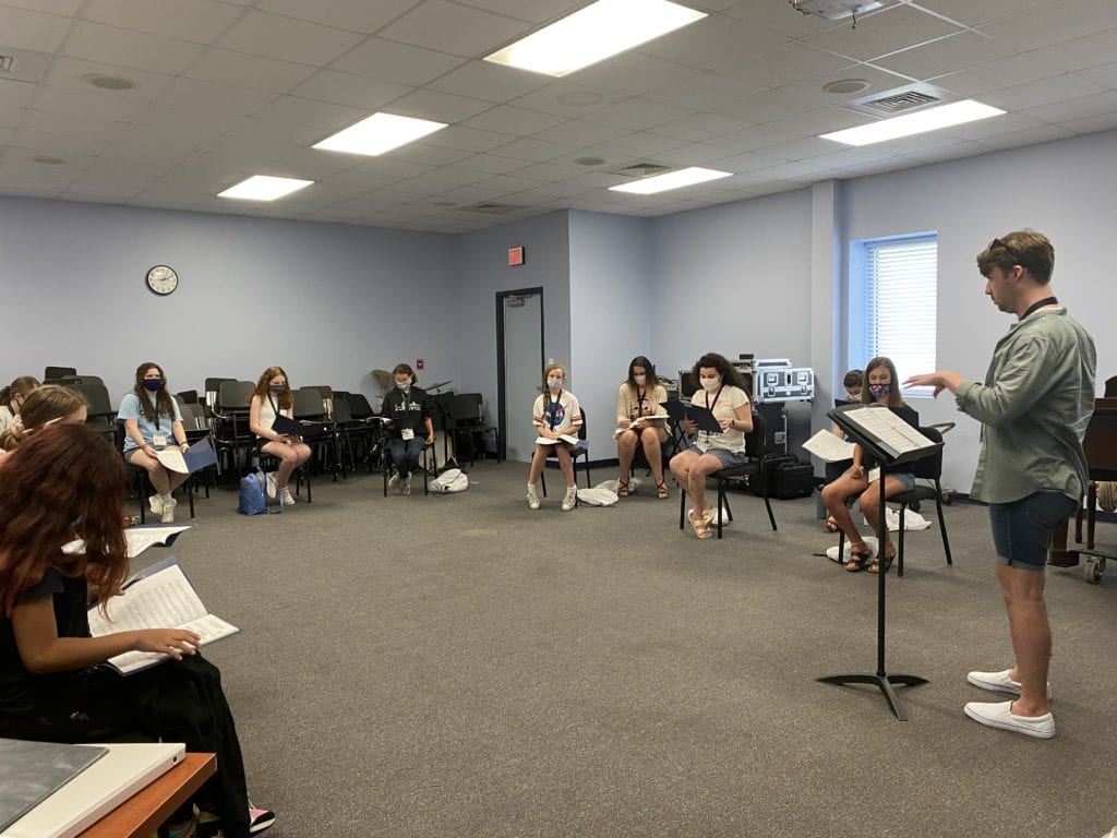 Singers, brass, and woodwind performers were distanced at six feet or more during rehearsals, with frequent breaks for air exchange. String and piano performers wore masks during rehearsals and other indoor activities at Charleston Southern