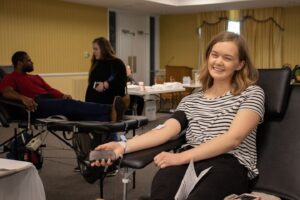 A CSU student donating blood on campus.