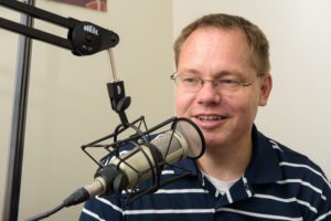 Dr. Link speaks in the microphone