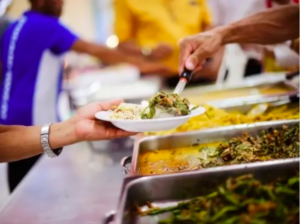 Food is being served on a plate