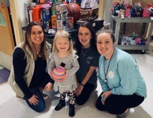 CSU junior Anna Covington gives toys to kids battling cancer at Prisma Health Children's Hospital in Columbia