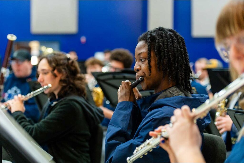 Charleston Southern music majors performing in an orchestra.