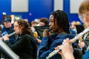 Charleston Southern music majors performing in an orchestra.