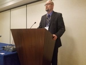 Dr. Jonathan Watson speaks on baptism at ETS Conference in 2019.