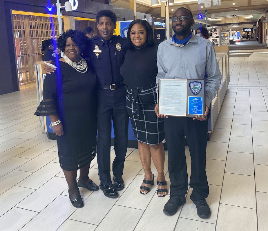 CSU alum Marlin Brown receives a Civilian Achievement Award for his heroic actions during the Valentine's Day shooting at Northwoods Mall.
